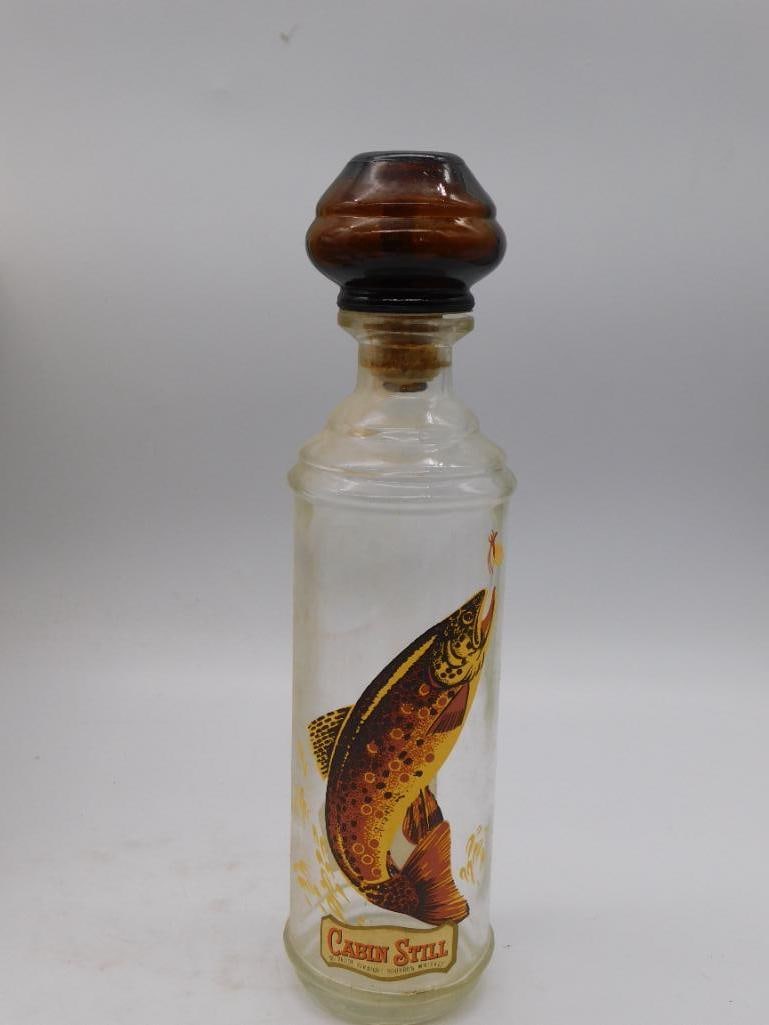 Gilbey's Very Royal Imported Scotch: A ceramic jug decanter for Gilbey's Very Royal Imported Scotch Whiskey, with an applied handle and a hand-painted sailing ship medallion. The cream ground sets off the medallion admirably. The