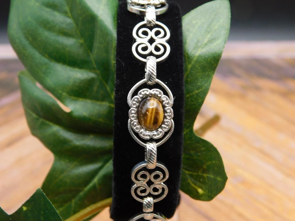 TIGERS EYE STONE BRACELET ROCK STONE LAPIDARY SPECIMEN: Tigers Eye Stone Bracelet Rock Stone Lapidary Specimen. See photos for exact size and condition.