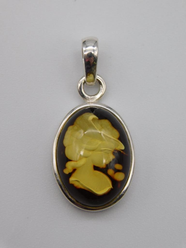 CARVED AMBER STERLING SILVER PENDANT ROCK STONE LAPIDARY SPECIMEN: Thank you for attending HATMAN AUCTIONS! Yes, we ship all items that are not oversized. Please see photos for measurements and description. SPECIAL NOTICE: Many items are PICK UP ONLY by APPOINTMENT O