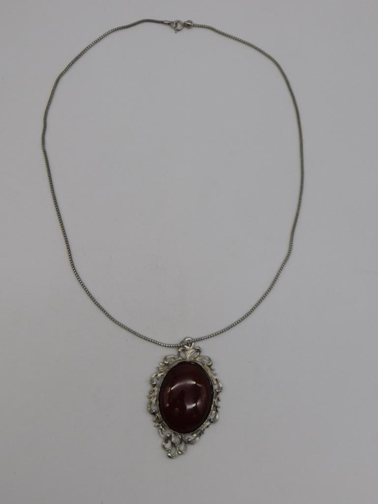 GENUINE STONE PENDANT ON CHAIN ROCK STONE LAPIDARY SPECIMEN: Genuine Stone Pendant On Chain Rock Stone Lapidary Specimen. See photos for exact size and condition.