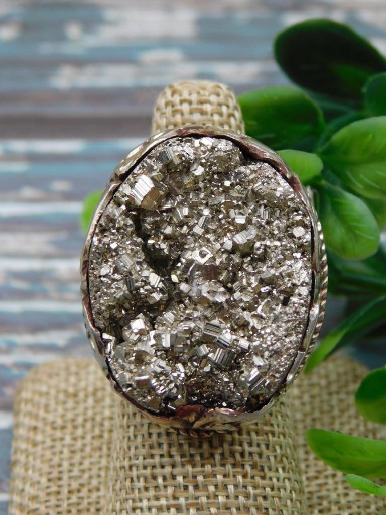 PYRITE ADJUSTABLE RING ROCK STONE LAPIDARY SPECIMEN: We are an auction house conducting a live auction with several hundred lots. It sometimes takes up to three weeks to ship, and announcements are made during the auction that affect some items.