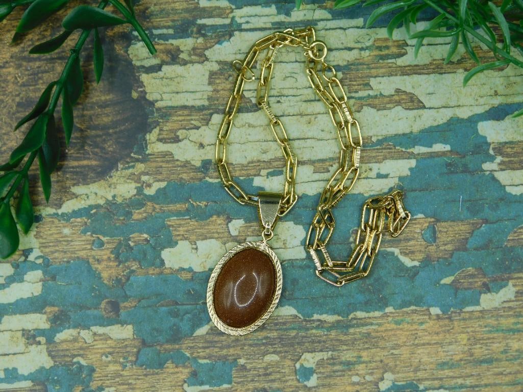 GOLDSTONE PENDANT NECKLACE ROCK STONE LAPIDARY SPECIMEN: We are an auction house conducting a live auction with several hundred lots. It sometimes takes up to three weeks to ship, and announcements are made during the auction that affect some items.