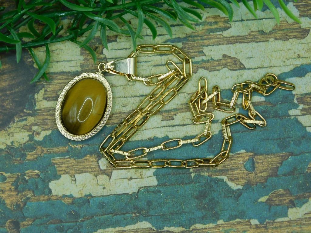 TIGERS EYE PENDANT NECKLACE ROCK STONE LAPIDARY SPECIMEN: We are an auction house conducting a live auction with several hundred lots. It sometimes takes up to three weeks to ship, and announcements are made during the auction that affect some items.