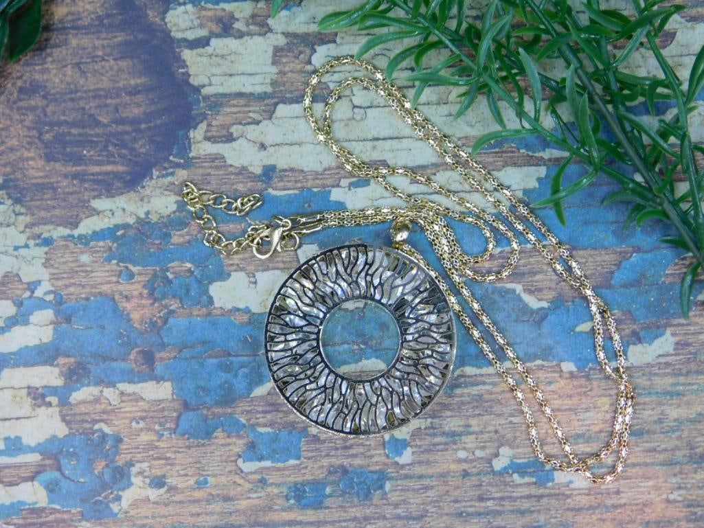 FASHION JEWELRY: We are an auction house conducting a live auction with several hundred lots. It sometimes takes up to three weeks to ship, and announcements are made during the auction that affect some items.