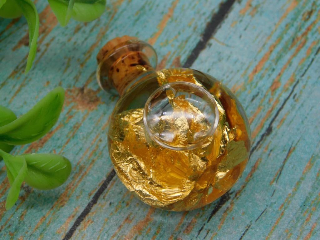 GOLD FLAKES IN BOTTLE: GOLD FLAKES IN BOTTLE ROCK STONE LAPIDARY SPECIMEN