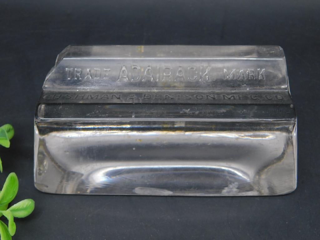 CUSHMAN AND DENISON ADAIRACK PAPERWEIGHT: Cushman And Denison Adairack Paperweight. See photos for exact size and condition.