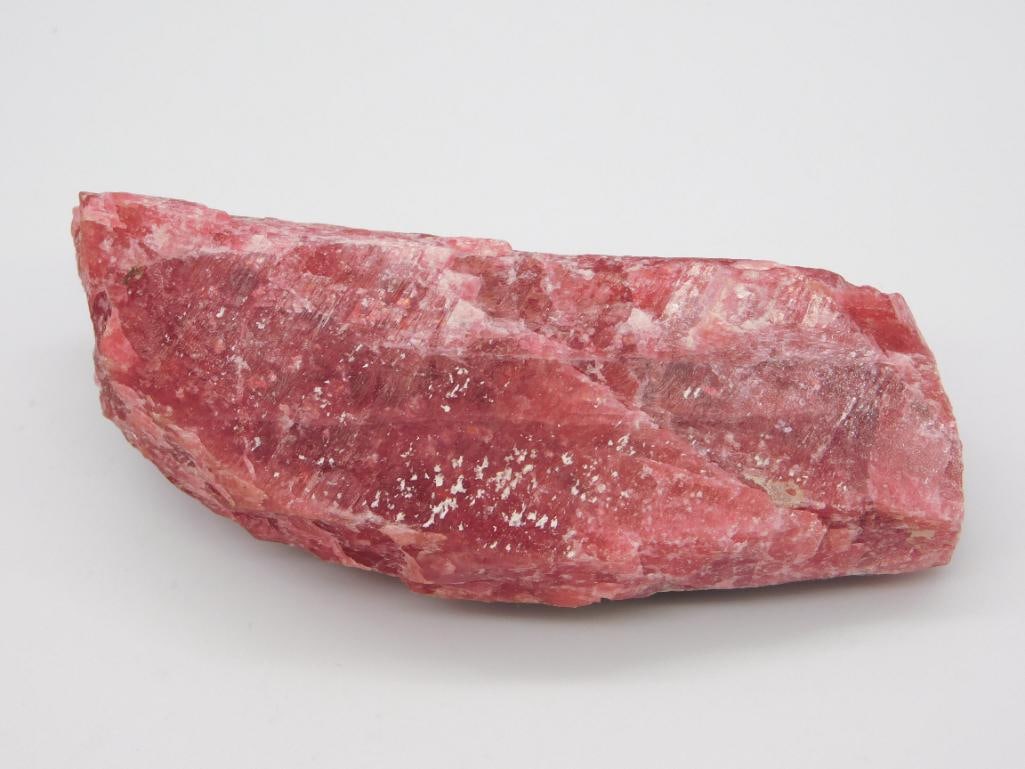 GEM RHODONITE 895 CARATS ROCK STONE LAPIDARY SPECIMEN: Gem Rhodonite 895 Carats Rock Stone Lapidary Specimen. See photos for exact size and condition.