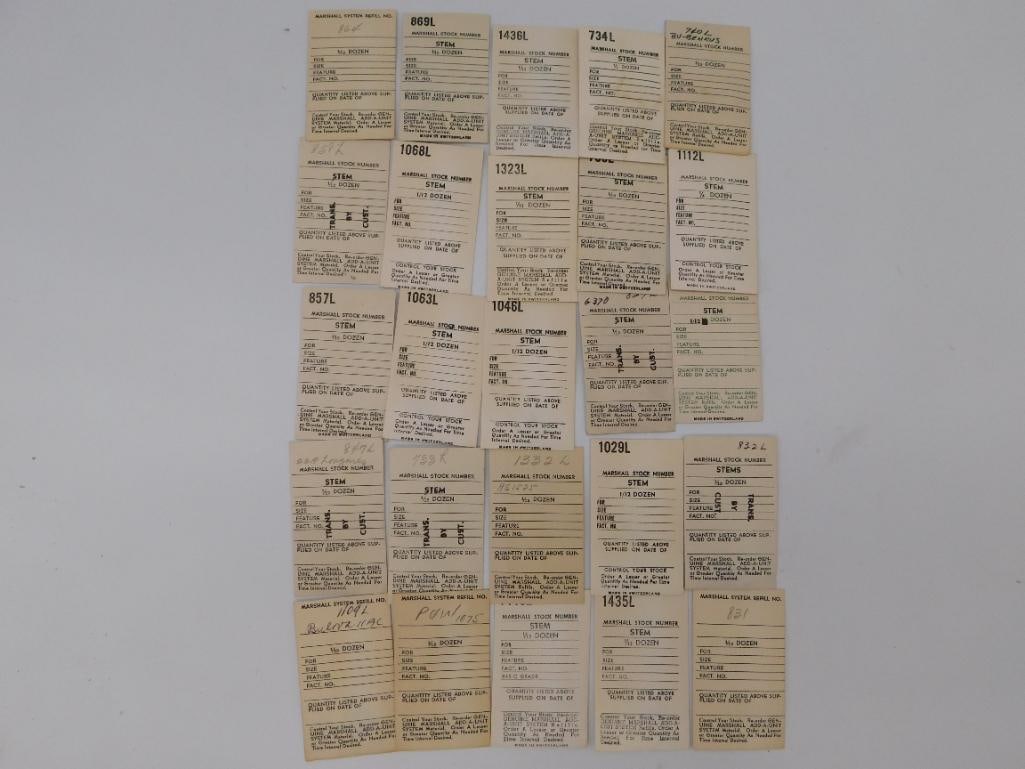 Ephemera: Vintage Marshall Watch Stem Stock Cards Lot: Approximately 25 "Marshall Stock Number" watch stem reference cards, mostly "Made in Switzerland," together with three loose vintage replacement winding stems. Cards include handwritten stock and cust