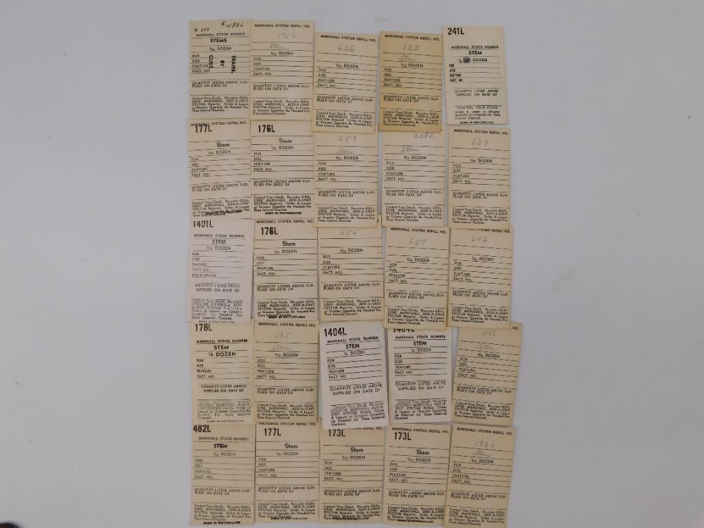 Antique Watch Parts: Marshall Stem Refill Stock Cards & Stems: Group of vintage 'Marshall System' watch stem refill stock cards (stem numbers including 176L, 692L, 600L) alongside a set of 3 brass/steel watch crown stems measuring approximately 1.5-2 inches long.