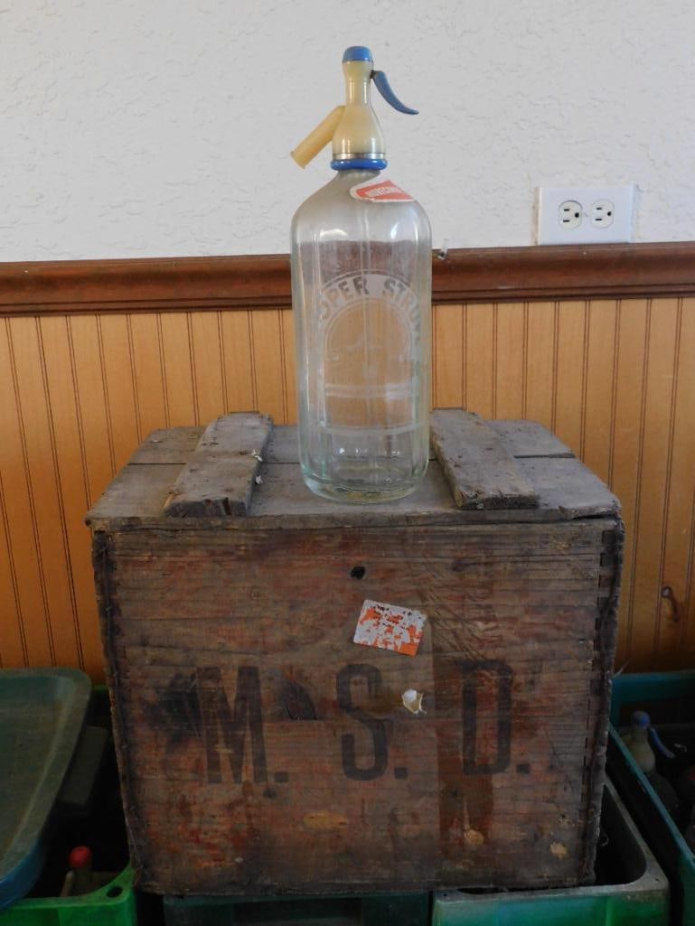 Antique M.S.D. Crate with 6 Hooper Struve Soda Syphons: A wooden crate stenciled 'M.S.D.' holds six glass soda syphon bottles with red and blue spray heads, several bearing original 'Hooper Struve' paper labels. Included etched glass bottles are a 'Hooper 