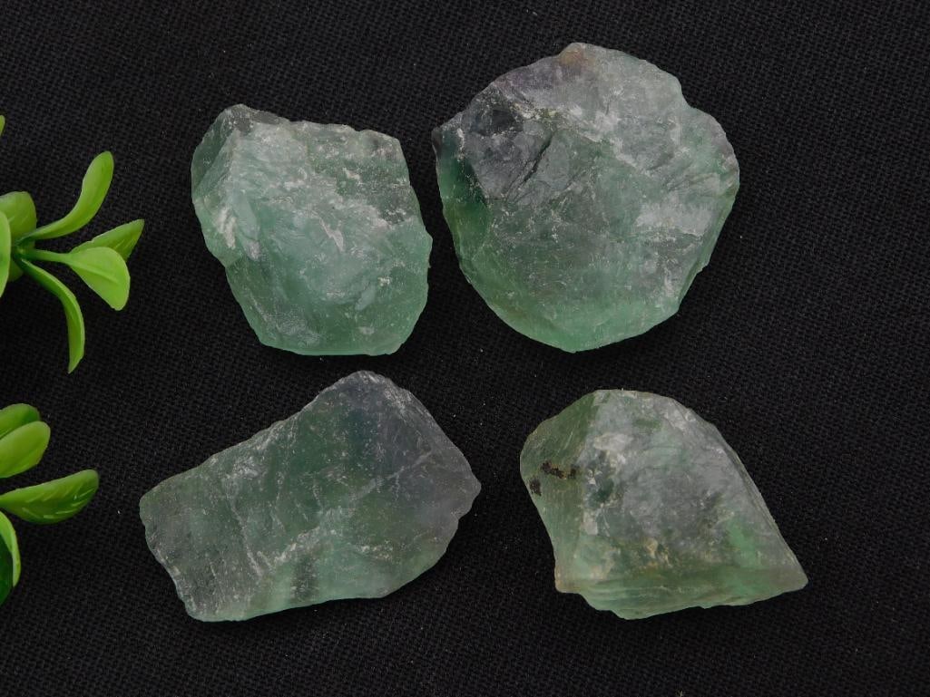 Fluorite Rough Mineral Specimens, Green, 116 Grams, Set of 4: Set of four natural rough green fluorite crystal specimens with translucent color and visible cleavage faces. Combined weight is 116 grams; pieces range from approximately 1.5 to 2 inches, shown with