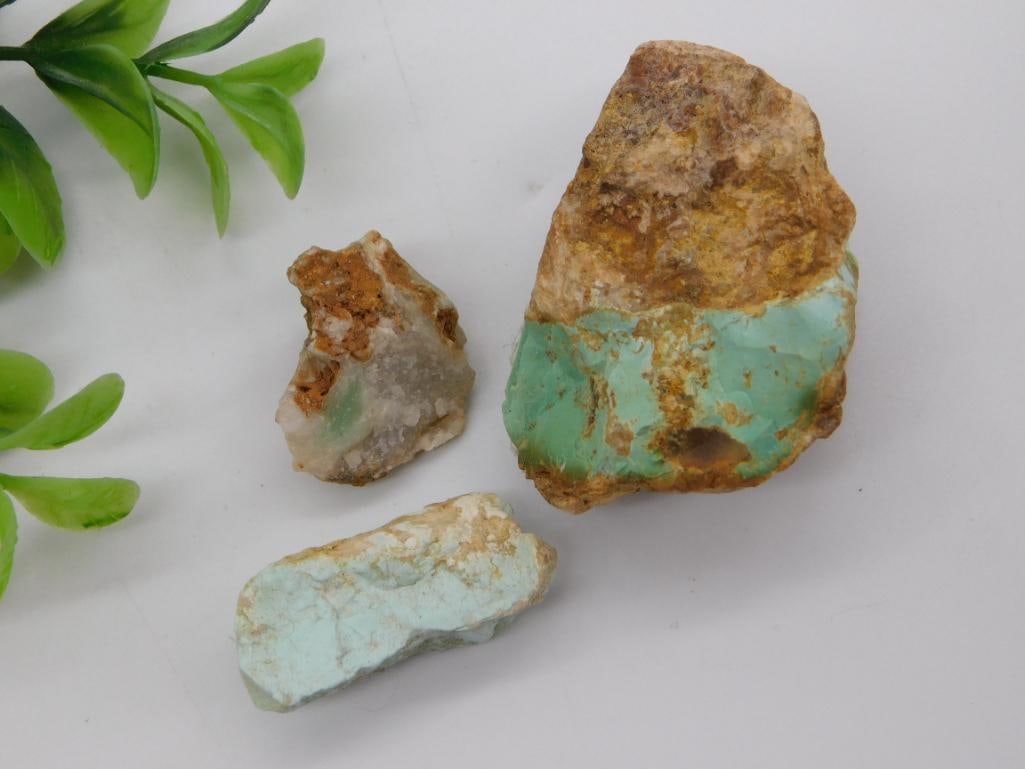Rock - Raw Turquoise Nugget Specimens (3-Piece Lot): Lot of three natural rough turquoise specimens in varying shades of green-blue, still embedded in their native rusty brown and tan host rock matrix. Combined weight is 42 grams per the handwritten