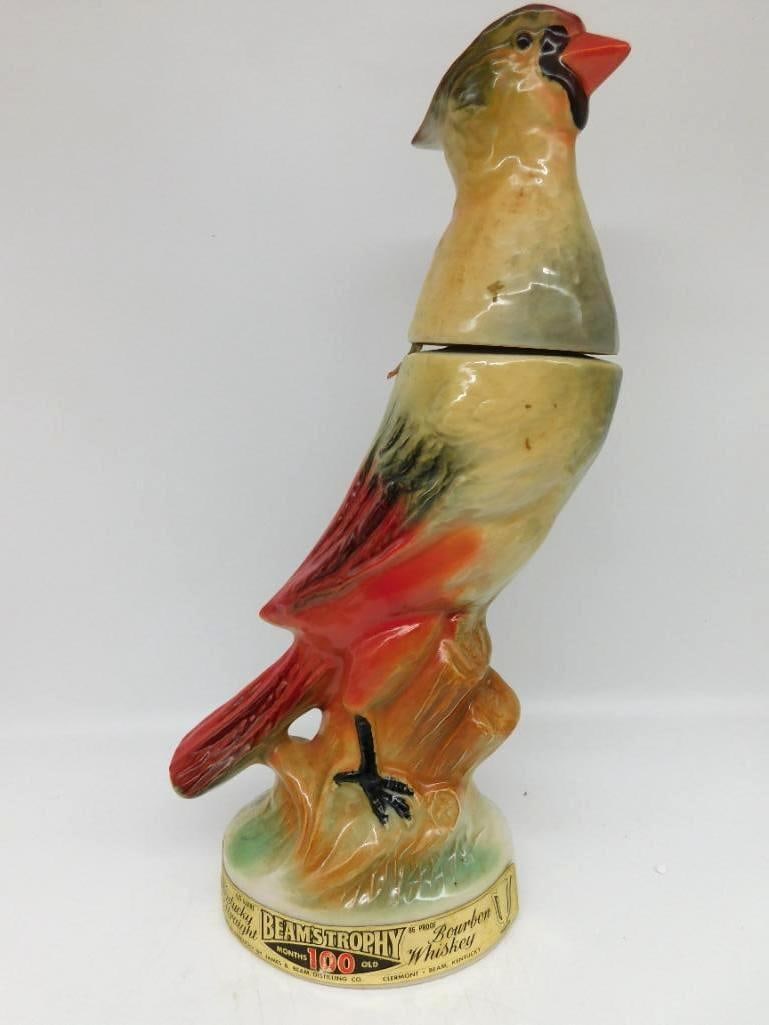 Jim Beam Beam's Trophy Cardinal Bird Regal China Decanter: A second example of the Jim Beam Regal China Beam's Trophy cardinal the bird perched upon a tree stump base with its crest raised. The red has held its warmth and the modeling is crisp. Approximately