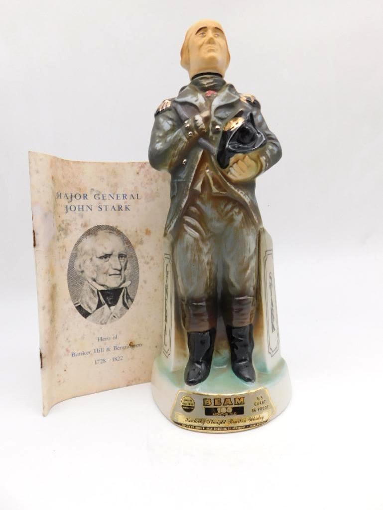Jim Beam General John Stark Live Free or Die Decanter with Booklet: A Jim Beam decanter modeled as Major General John Stark Revolutionary War hero of Bunker Hill and Bennington in dress uniform. The base carries the Bennington Battle Flag and the Live Free or Die mott