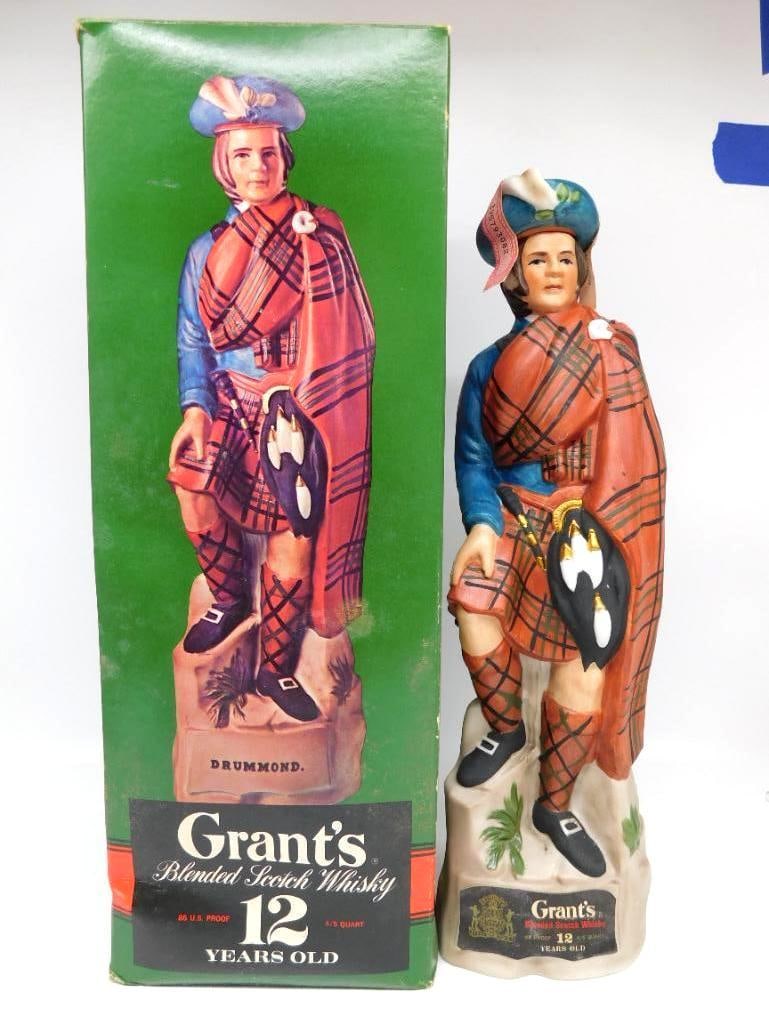 Grant's 12 Year Old Drummond Scottish Clansman Decanter with Original Box: A stately porcelain decanter issued for Grant's Blended Scotch modeled as the clansman Drummond in a russet tartan plaid and kilt dirk at his belt and sporran at his side standing upon a rocky outcrop
