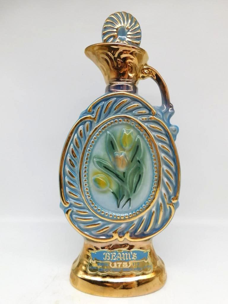 Jim Beam 175th Anniversary Gold Luster Tulip Ewer Decanter in Presentation Box: A capital Jim Beam Regal China ewer in gold luster the rim worked in a blue and gold feathered design and the body set with a hand-painted tulip medallion marking Beam's 175 Months. Handsome enough