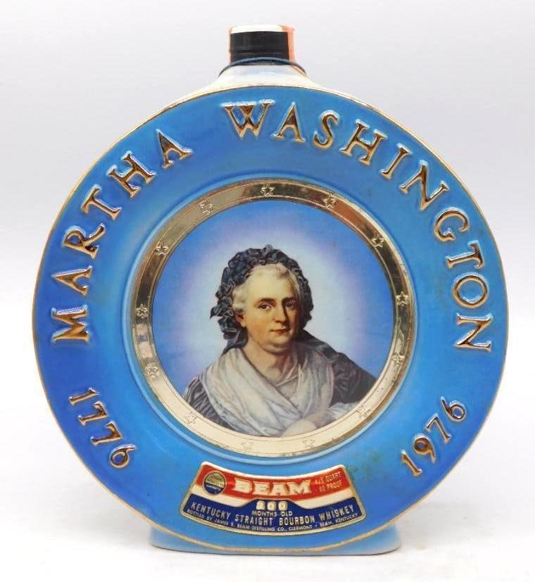 Jim Beam Martha Washington 1776-1976 Bicentennial Decanter Seal Intact: A handsome Jim Beam Regal China decanter struck as a round blue medallion Martha Washington's portrait set within a gilt star border lettered 1776 and 1976. The blue ground is deep and even and the