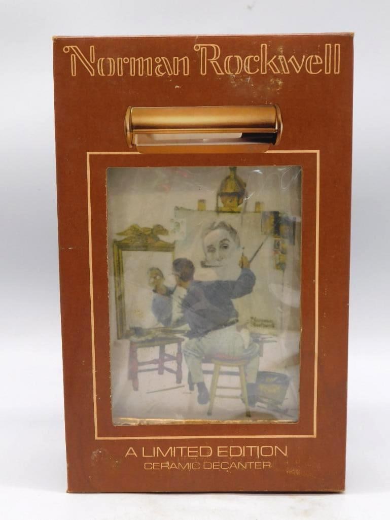 Norman Rockwell Triple Self-Portrait Ceramic Decanter Seal Intact with Original Box: A third example of the limited edition Norman Rockwell ceramic decanter by The Mike Wayne Distilling Co. rendered after his Triple Self-Portrait. Complete in its original box and still wearing its