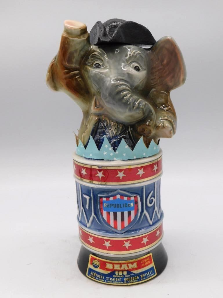 Jim Beam 1976 Bicentennial Republican Elephant Drum Political Decanter: A Jim Beam Bicentennial decanter of 1976 modeled as the Republican elephant in a patriot's hat standing atop a drum base in red white and blue lettered 76 and Republican. A spirited piece of campaign-