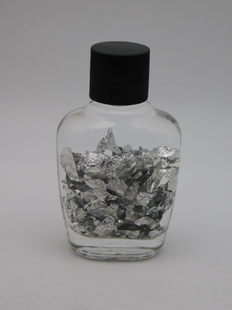SILVER FLAKES IN A BOTTLE ROCK STONE LAPIDARY SPECIMEN: Silver Flakes In A Bottle Rock Stone Lapidary Specimen. See photos for exact size and condition.