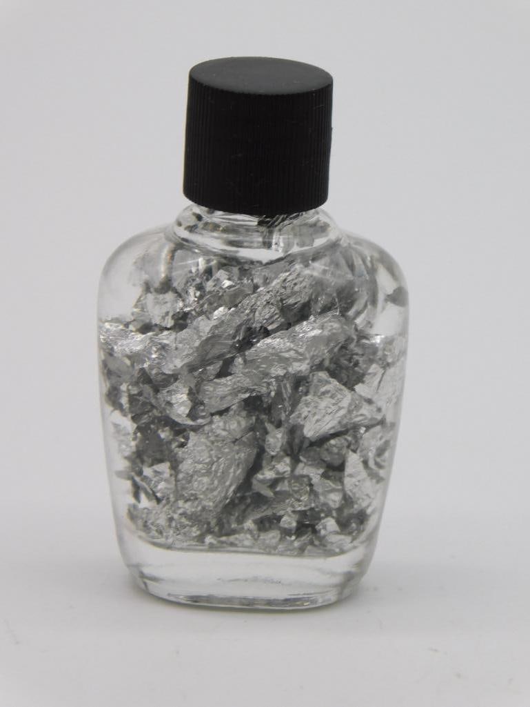 SILVER FLAKES IN BOTTLE ROCK STONE LAPIDARY SPECIMEN: Silver Flakes In Bottle Rock Stone Lapidary Specimen. See photos for exact size and condition.