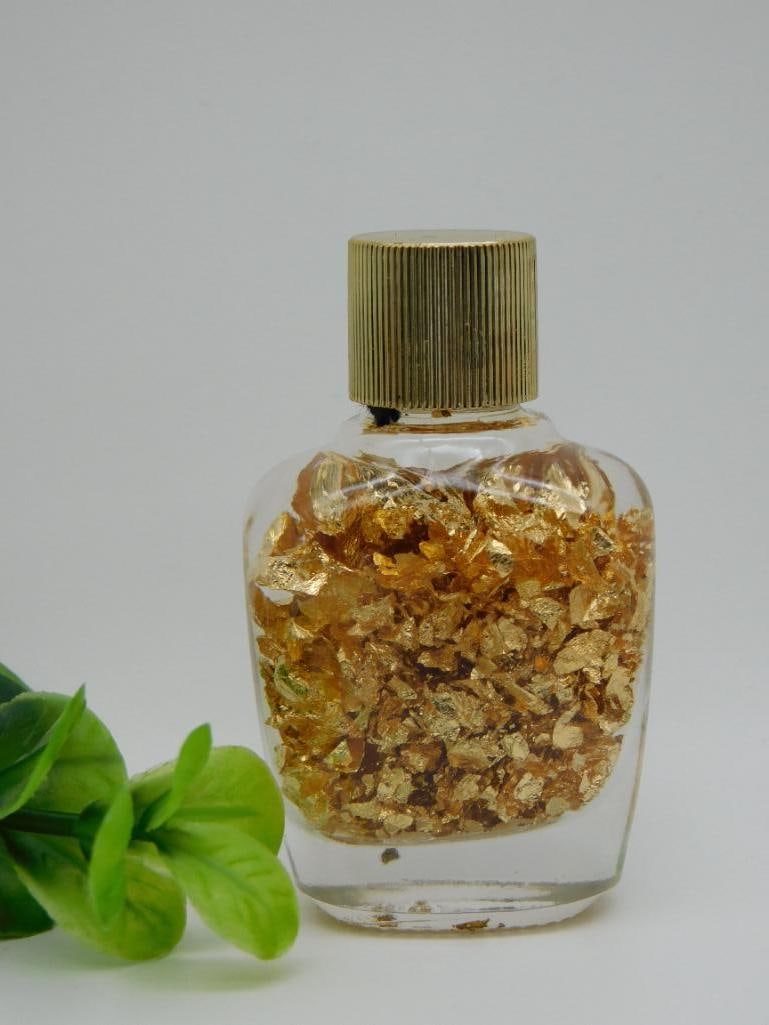 GOLD FLAKES IN A BOTTLE ROCK STONE LAPIDARY SPECIMEN: Gold Flakes In A Bottle Rock Stone Lapidary Specimen. See photos for exact size and condition.