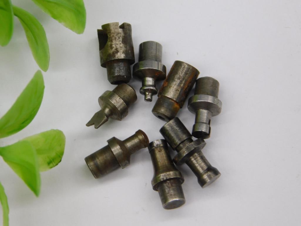 Lot of Watchmaker Staking Punches with Forked Die (9 pcs): Nine watchmaker staking set punches and dies, including a notched forked-tip punch, in mixed steel and lightly rusted finishes. Used for watch case, jewel, and hand-setting work. See photos for exact