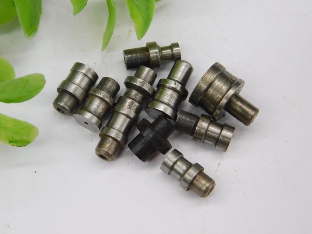 Watchmaker Staking Punches incl. Blackened Steel Piece: A group of unmarked steel watchmaker staking-set stakes with mixed flat and domed tips; one piece has a dark, blackened finish distinct from the bright steel of the others. See photos for exact size