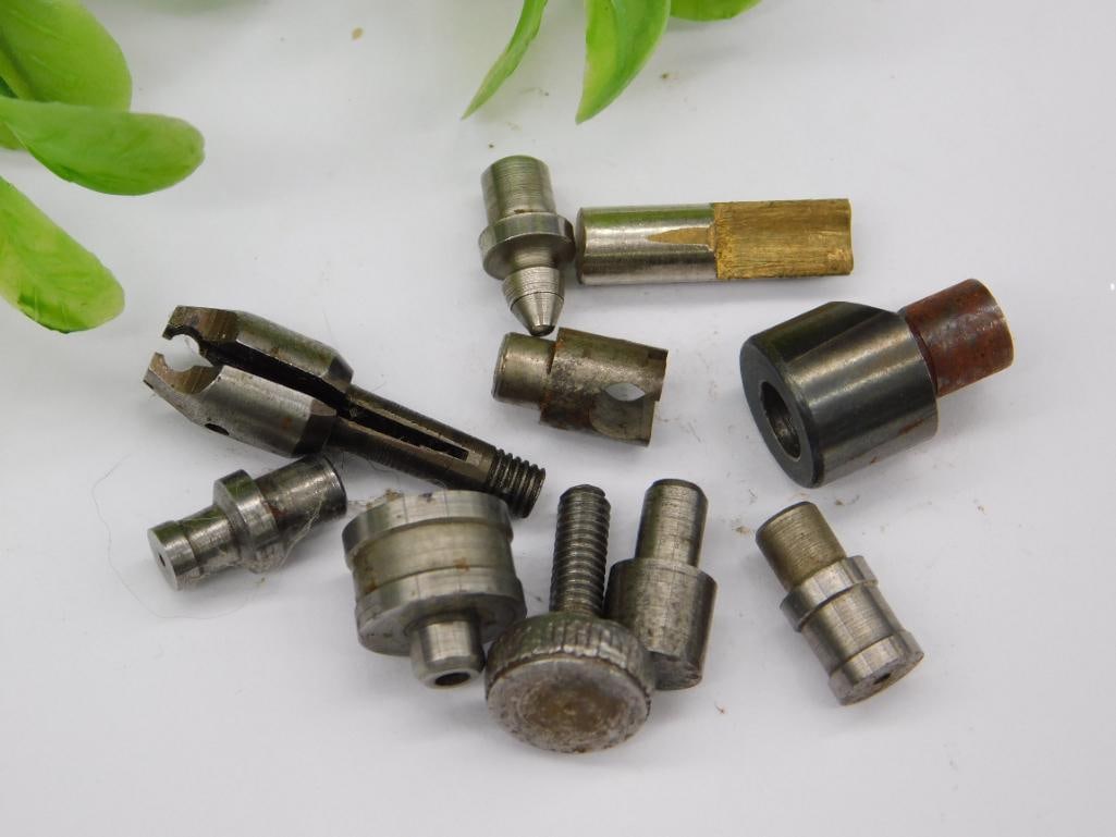 Watchmaker Staking Punches incl. Pointed Pin & Fork Bit: Assorted unmarked steel watchmaker staking-set and small tool pieces including a forked bit with a threaded shaft, a fine pointed pin, a knurled cap, and a rusted cup-shaped stake. See photos for