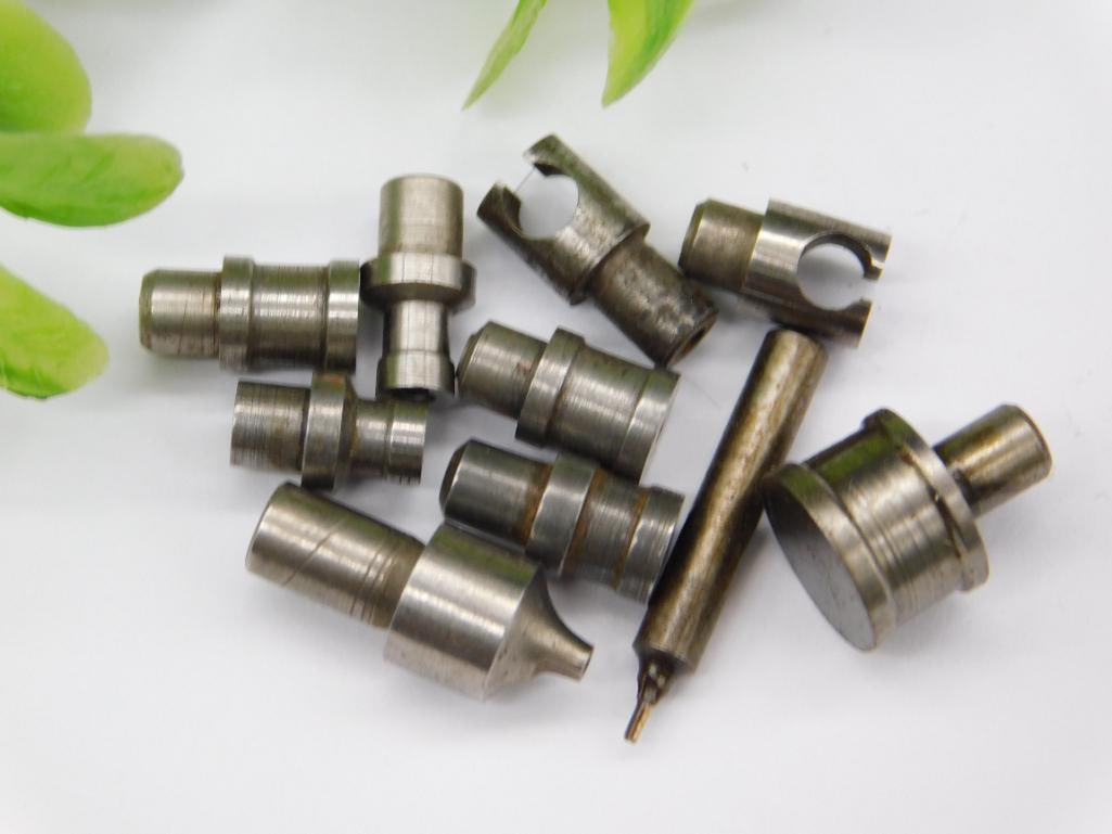 Watchmaker Staking Punches - Assorted Pointed Tips: A group of unmarked steel watchmaker staking-set stakes with several pointed and tapered tips alongside flanged and cupped punches of graduated sizes. See photos for exact size and condition.