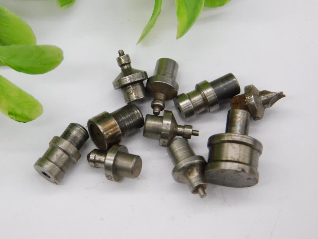 Watchmaker Staking Punches incl. Slotted Screw Tip: A group of unmarked steel watchmaker staking-set stakes including a slotted screw-style tip along with cupped, flanged, and pointed punches. See photos for exact size and condition.