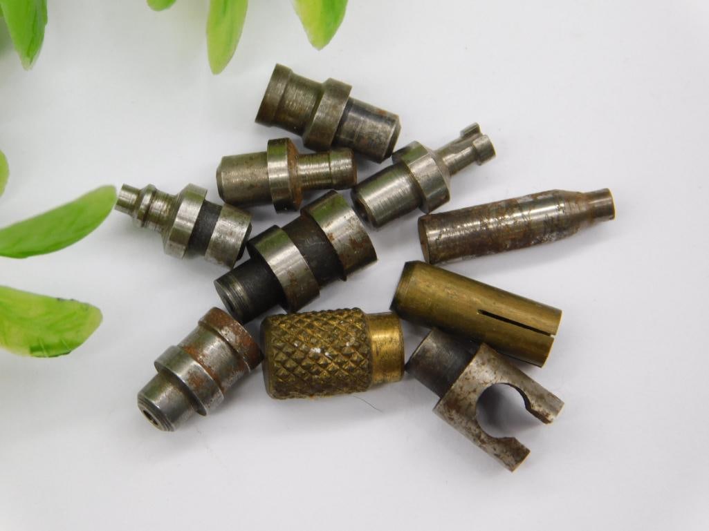 Watchmaker Lathe Collets & Stakes, Group of 11: Assortment of small steel stepped collets, stakes, and a slender pin-style tool, typical of watchmaker lathe or staking tool accessories. Finish ranges from clean steel to light rust. See photos for e