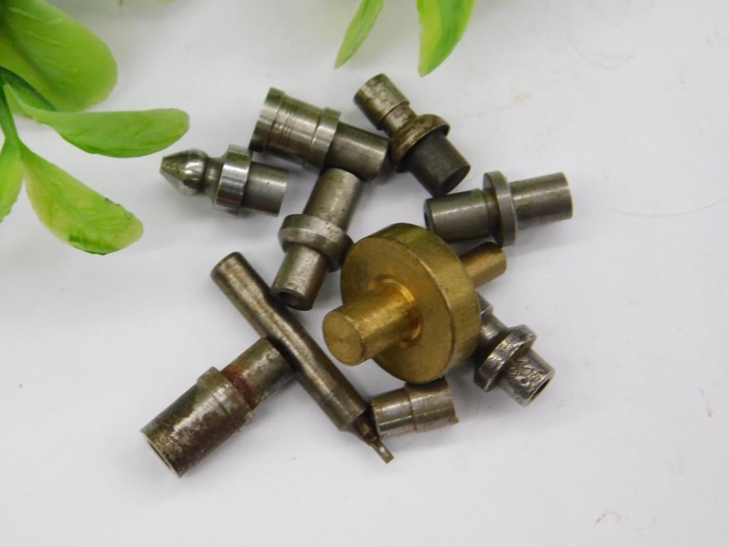 Watchmaker Tool Parts Lot, Punches & Stakes: Small grouping of steel stepped punches and stakes used with a watchmaker's staking or lathe tool set. Surfaces show typical light oxidation from age. See photos for exact size and condition.
