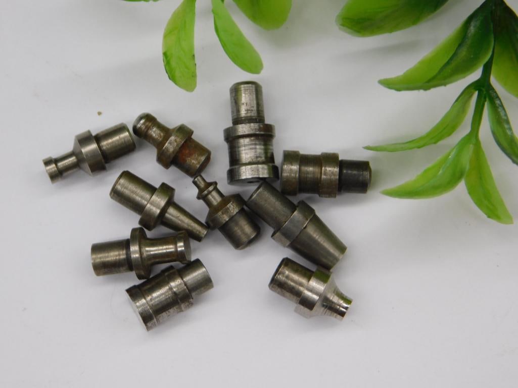 Watchmaker Tool Stakes & Fitted Collets, Lot: Grouping of small steel stepped stakes/collets, including a forked/notched piece, typical of watchmaker staking or lathe tool accessories. See photos for exact size and condition.