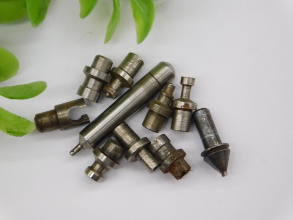 Watchmaker Tool Punches & Stakes, ~10 Pieces: Grouping of small steel stepped stakes and punches, including a forked tool bit, consistent with watchmaker lathe/staking accessories. See photos for exact size and condition.