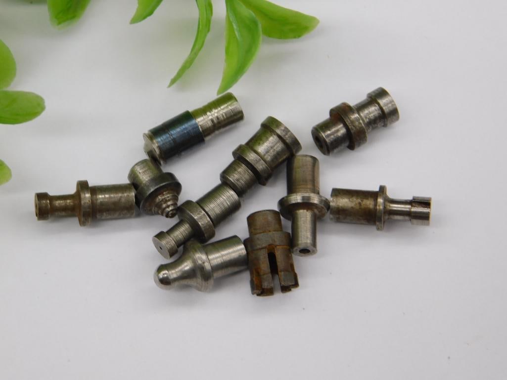 Watchmaker Tool Parts, Round-Tip Stakes, ~10 Pcs: Assortment of small steel stepped stakes with rounded and stepped tips, including a domed rusted piece, used with watchmaker staking or lathe tools. See photos for exact size and condition.
