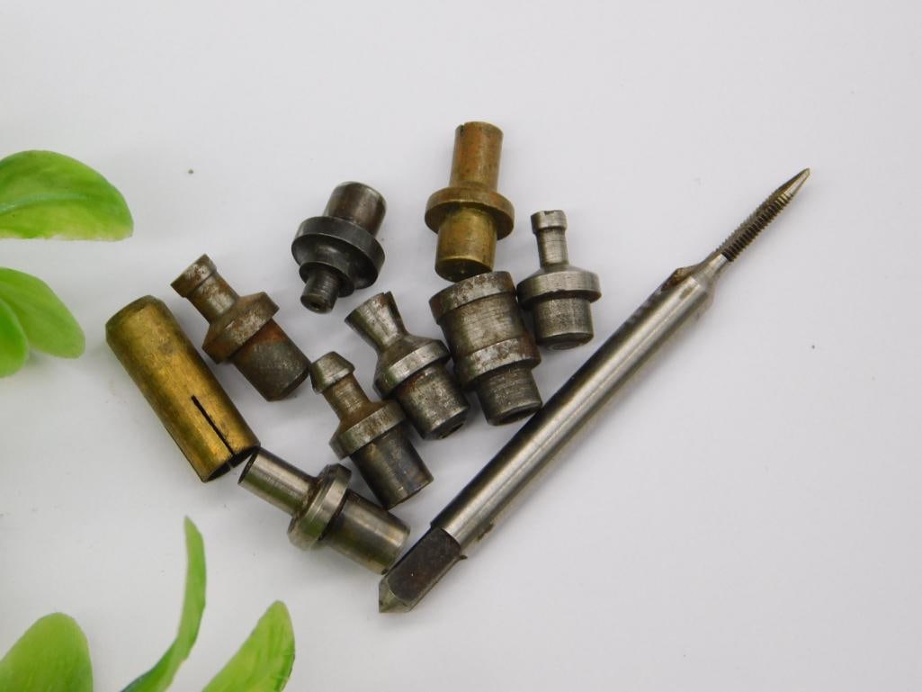 Watchmaker Tool Parts, Long Pin Punch & Stakes: Assortment of small steel stepped stakes and an elongated pointed pin punch, consistent with watchmaker lathe or staking tool accessories. See photos for exact size and condition.