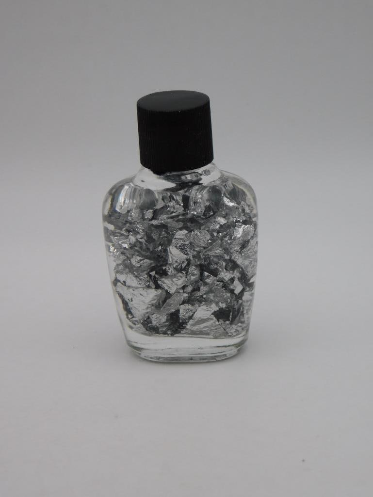 SILVER FLAKES IN BOTTLE ROCK STONE LAPIDARY SPECIMEN: Silver Flakes In Bottle Rock Stone Lapidary Specimen. See photos for exact size and condition.