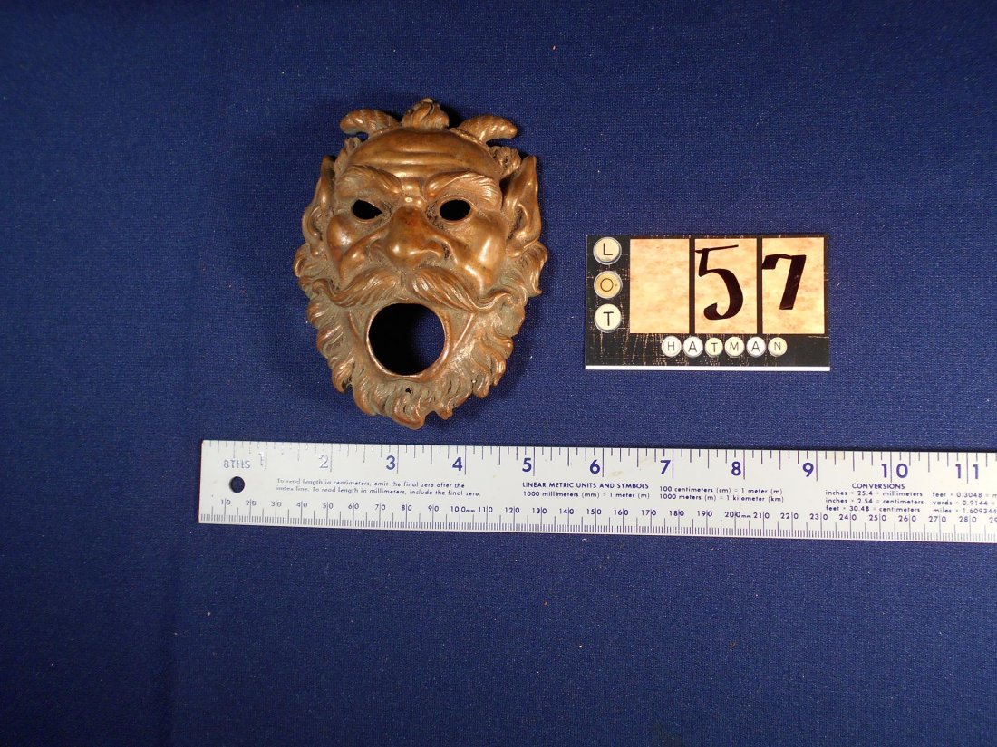 NORTH WIND BRONZE BOTTLE OPENER: See Photos for measurements and condition
