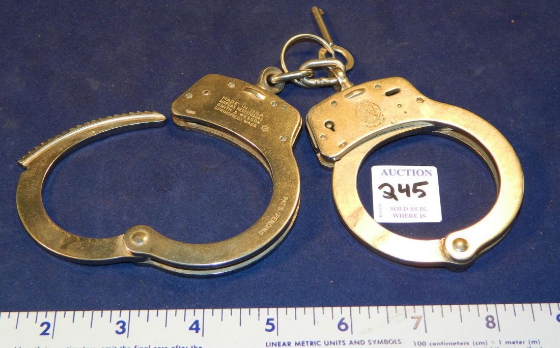 SMITH AND WESSON HANDCUFFS: See Photos for measurements and condition