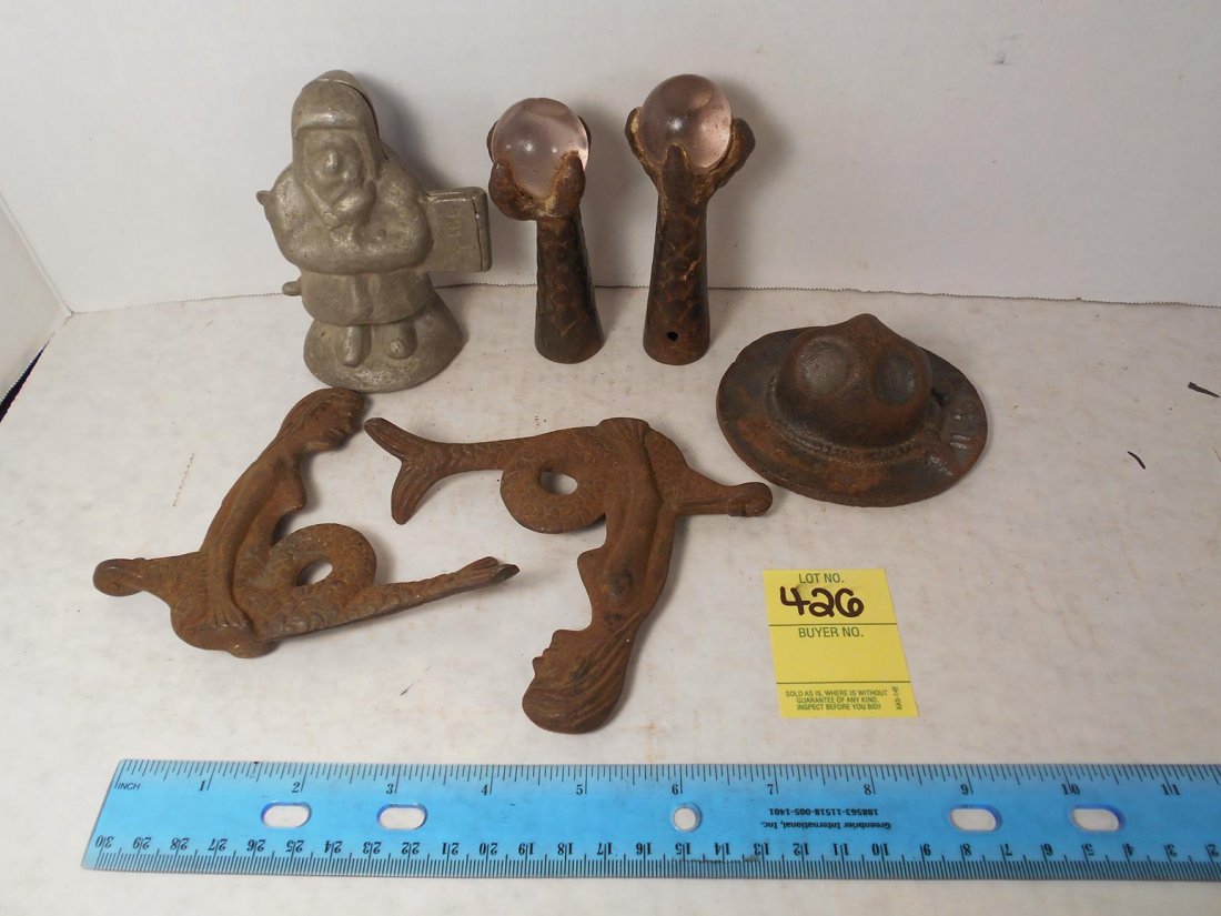 CAST IRON MERMAIDS, SANTA CHOCOLATE MOULD, CAST CLAWS: See photos for measurements and descriptions.