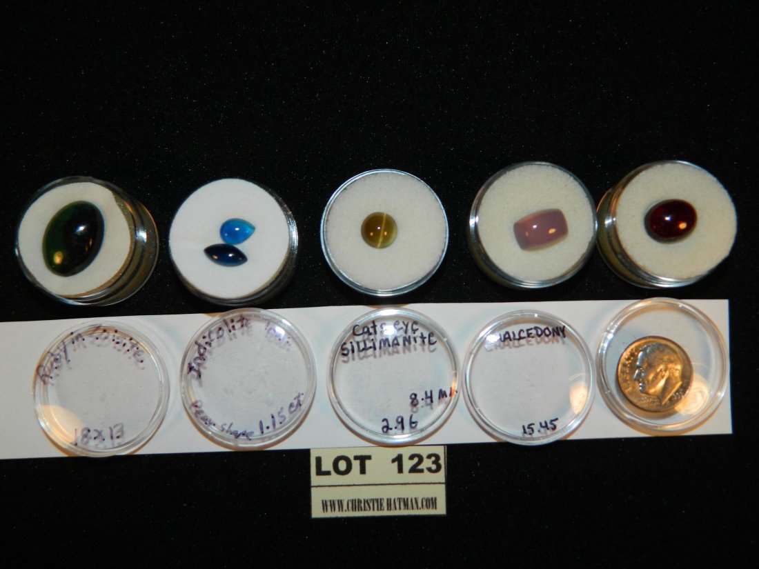 INDICOLITE CATS EYE SILLIMANITE PARCEL LOT MIXED: WELCOME TO HATMAN AUCTIONS. Visit www.christiehatman.com for 100's of color pictures. On this lot, please see photos for condition and measurements. WE SELL COLLECTIONS, so contact us when you want to