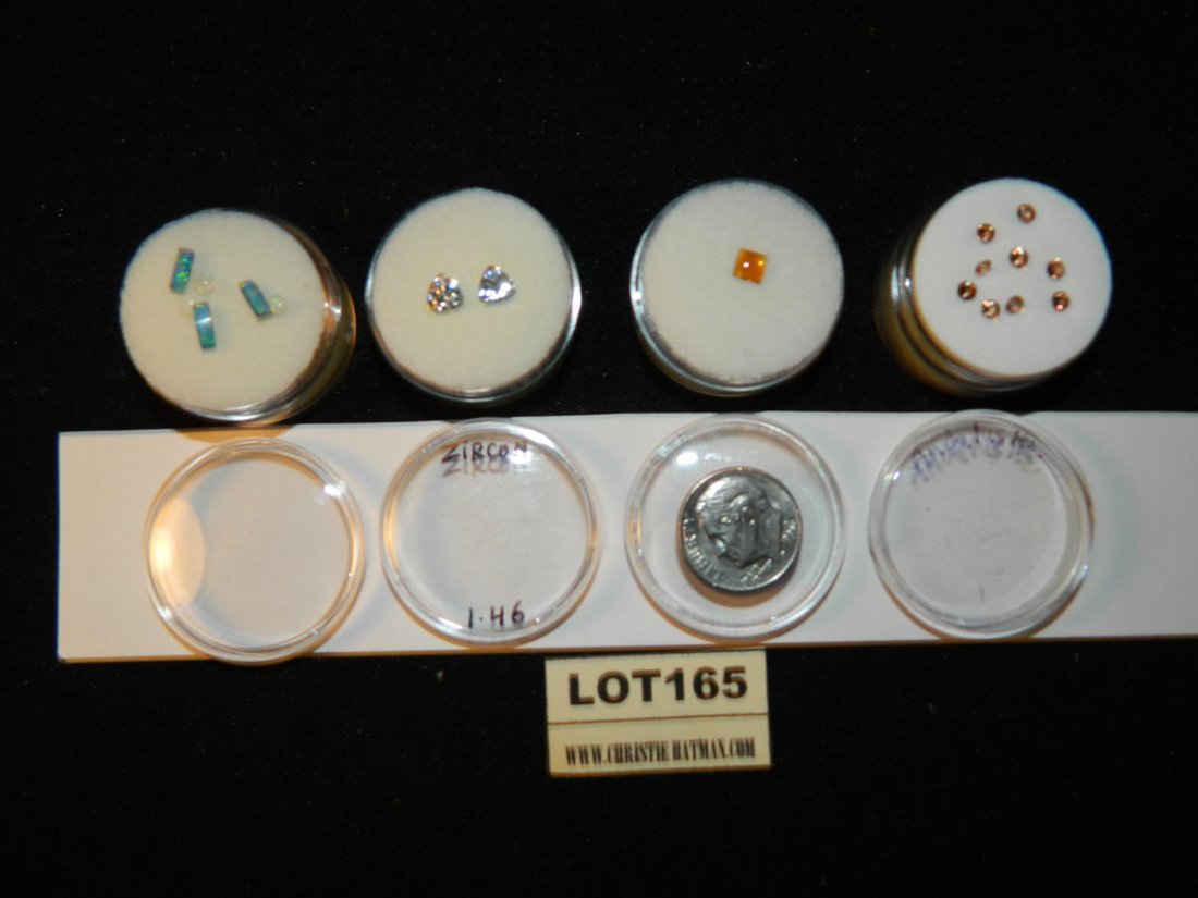 ZIRCON MANDARIN ANDELUSITE PARCEL LOT MIXED JEWELRY: WELCOME TO HATMAN AUCTIONS. Visit www.christiehatman.com for 100's of color pictures. On this lot, please see photos for condition and measurements. WE SELL COLLECTIONS, so contact us when you want to