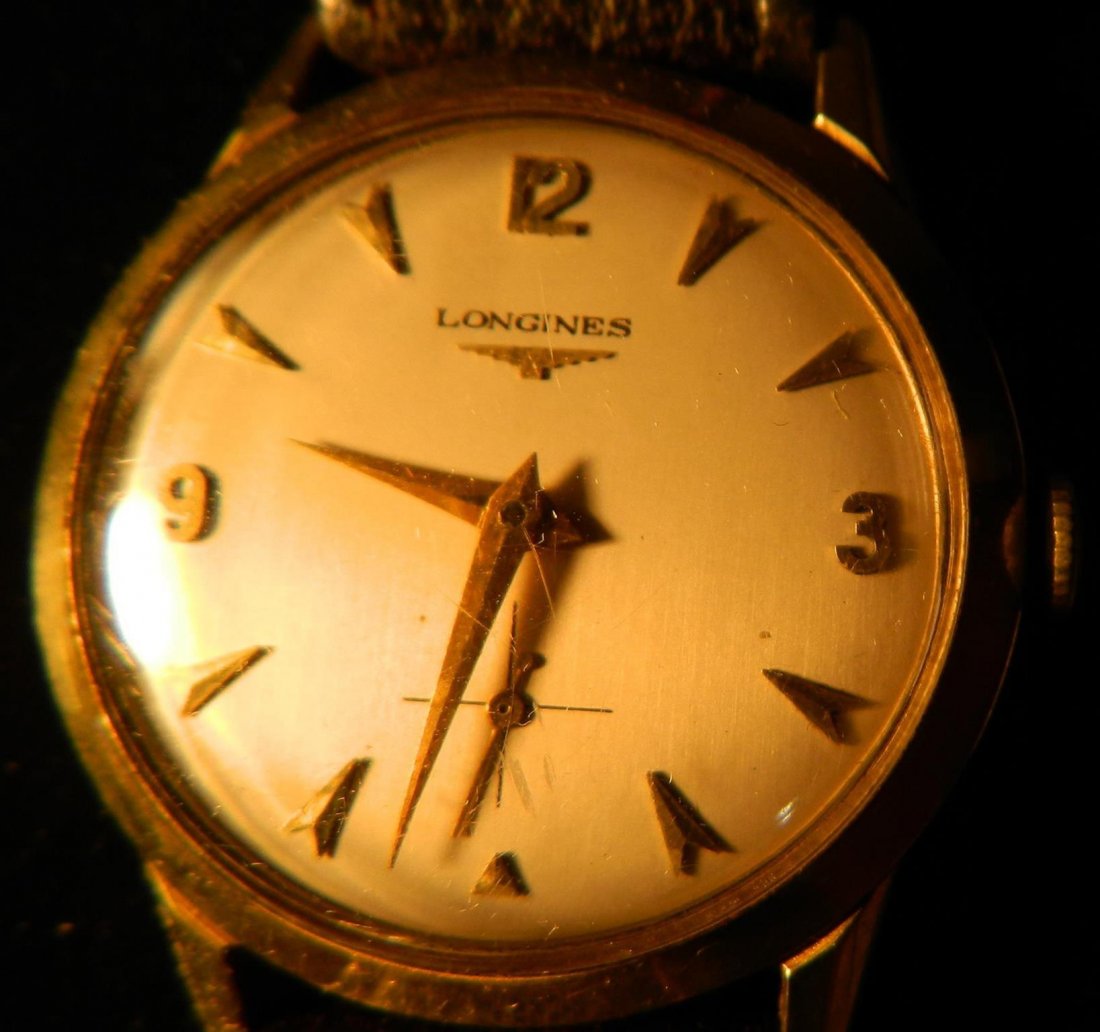 LONGINES MEN'S VINTAGE 10K GOLD WATCH: MAN'S 14K YELLOW LONGINES WATCH WITH LEATHER BANDGEMOLOGIST APPRAISED BY BRENT RAAB ID #7317158 IN 2015 FOR $700. ITEM COMES WITH A COPY OF THE APPRAISAL.