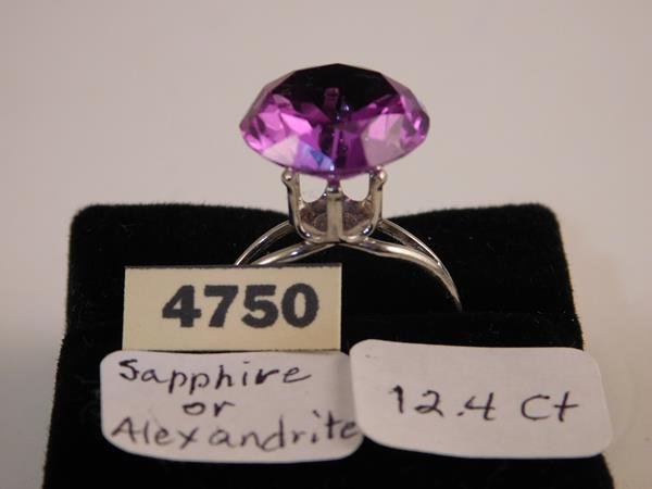 12.4CT SAPPHIRE OR ALEXANDRITE LOOSE STONE GEM: Please see photo for measurements and dimensions. Thank you for shopping at Hatman Auctions. This is the first of many online auctions that will feature one of the United States Largest collections of