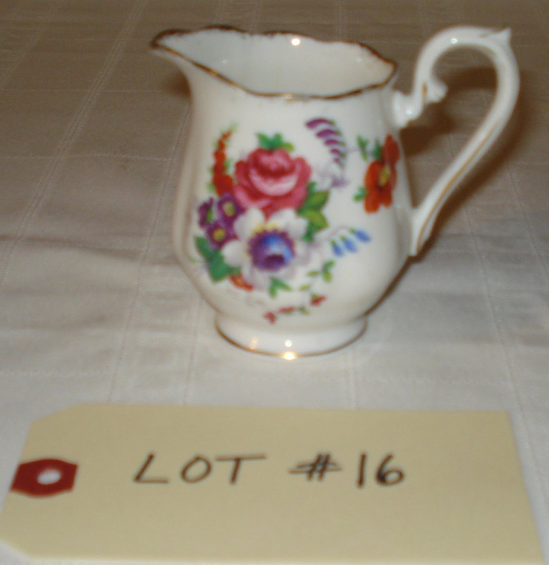 Royal Albert cream/milk jug: vintage Royal Albert bone china milk/cream jug. made in England. height:3 inches (8cm)