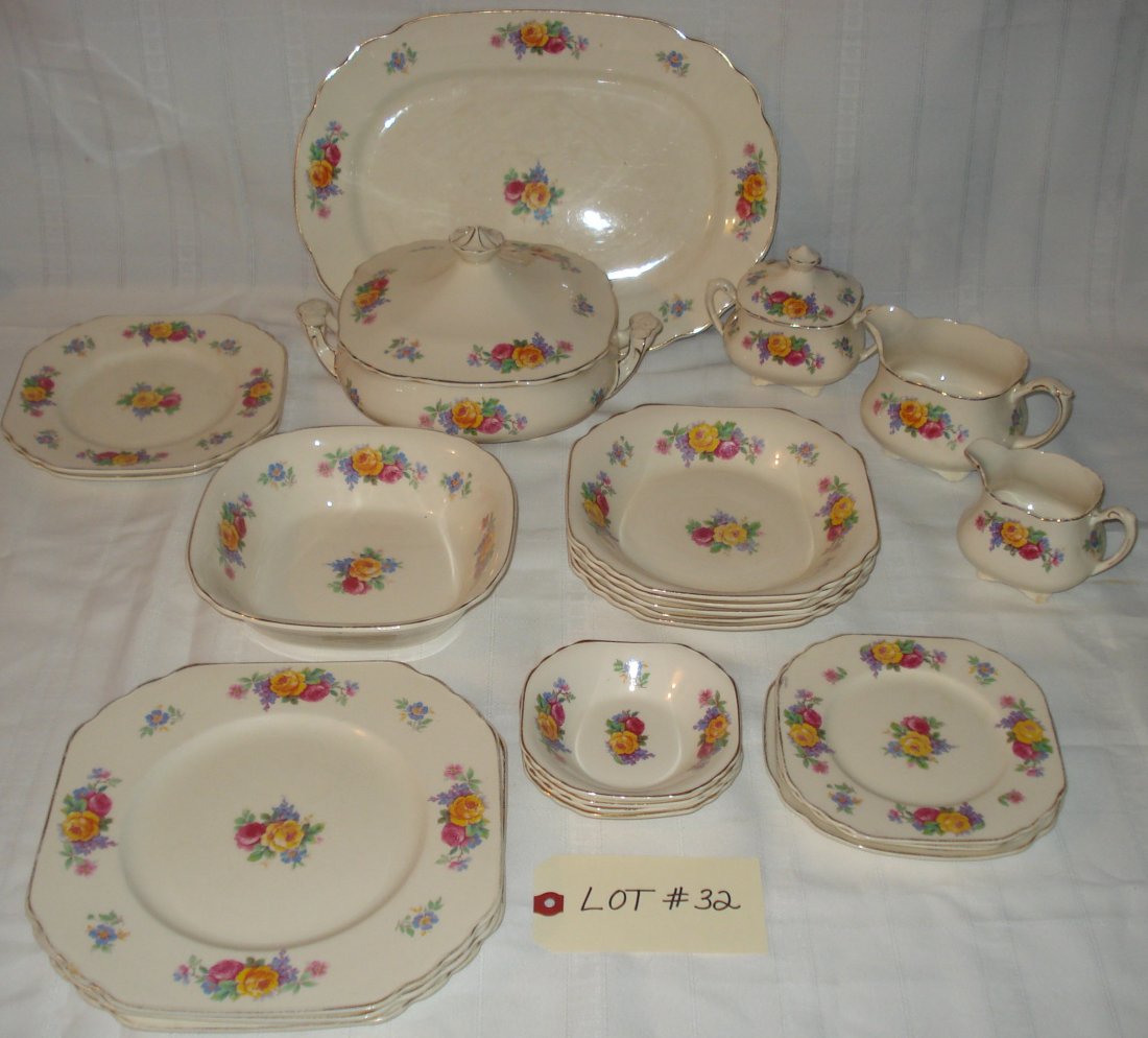 23-piece Wedgwood plates & bowls: 23-piece Wedgwood & Co. dinner plates & bowls (made in England). Mary Stuart pattern. large server plate, cream jug, milk jug, sugar bowl with lid, soup tureen with lid & assorted plates.