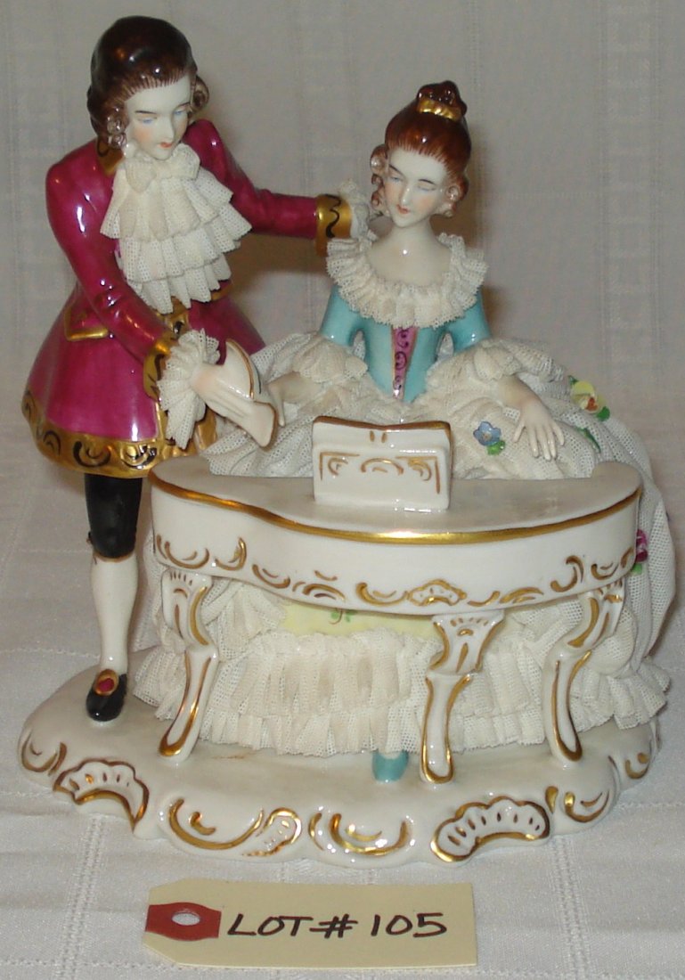 porcelain figurine: vintage porcelain figurine (signed N Germany). piano teacher with female student. height:7 inches (18cm)