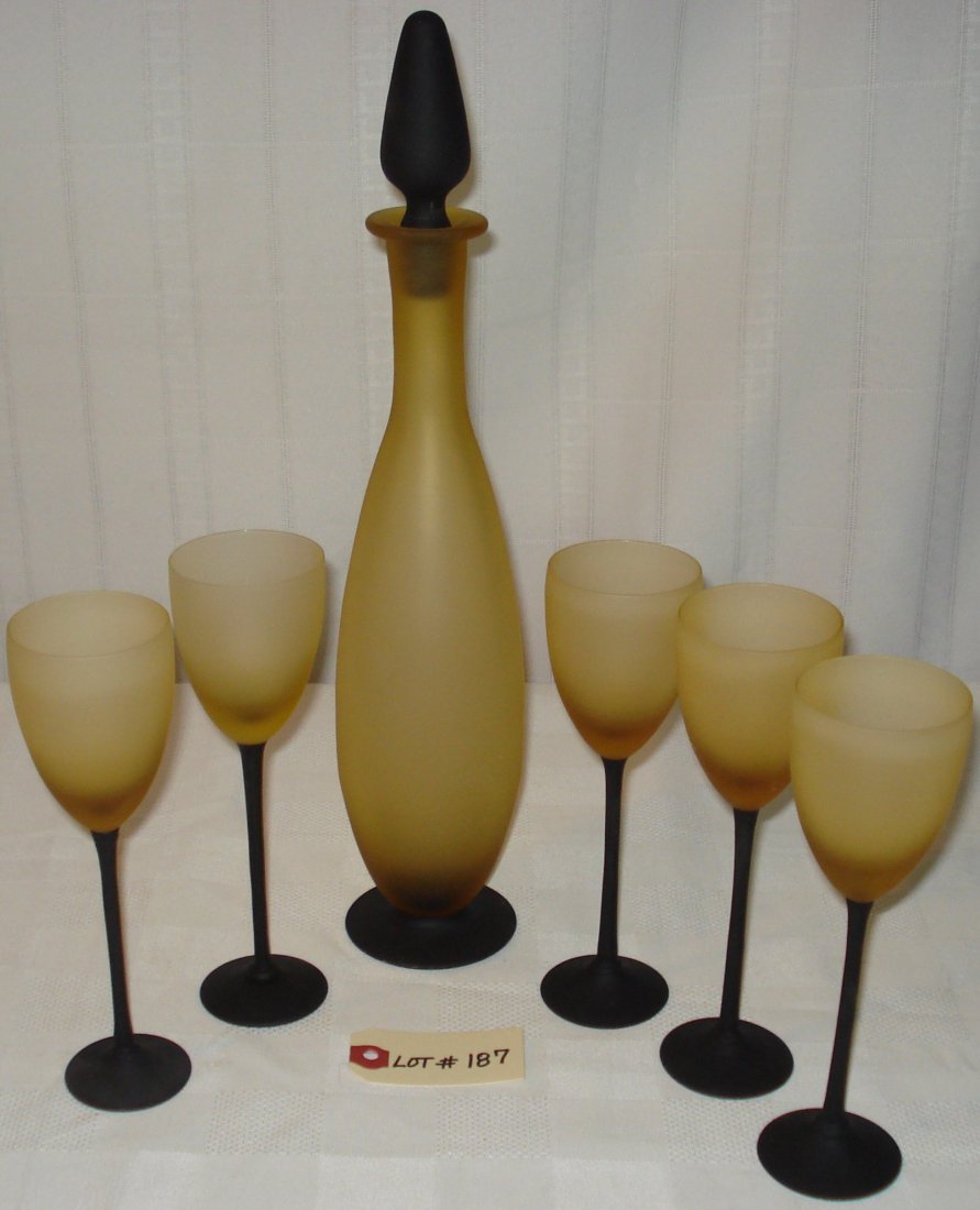 vintage carafe & 4+1 glasses: vintage carafe with stopper and 4+1 glasses (probably from Europe). carafe height:15 inches (38cm) and glasses height:7 1/2 inches (19cm)