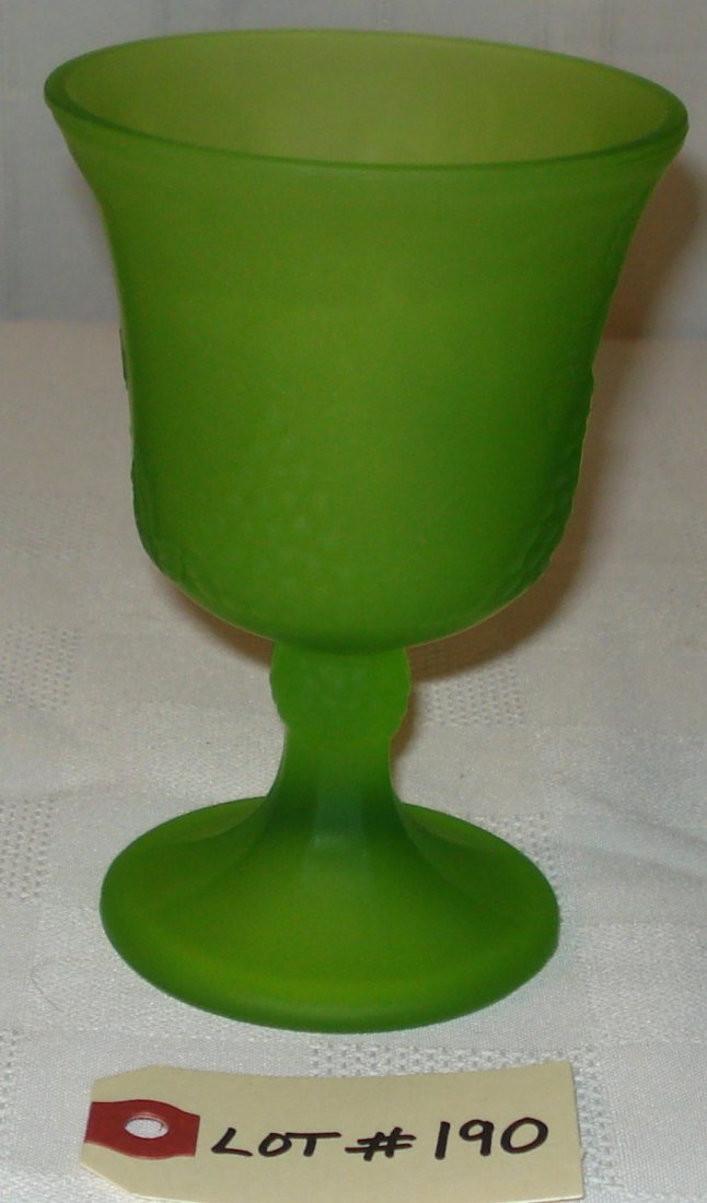 green wine glass: green wine glass with embossed grape motif. height:5 1/2 inches (14cm)